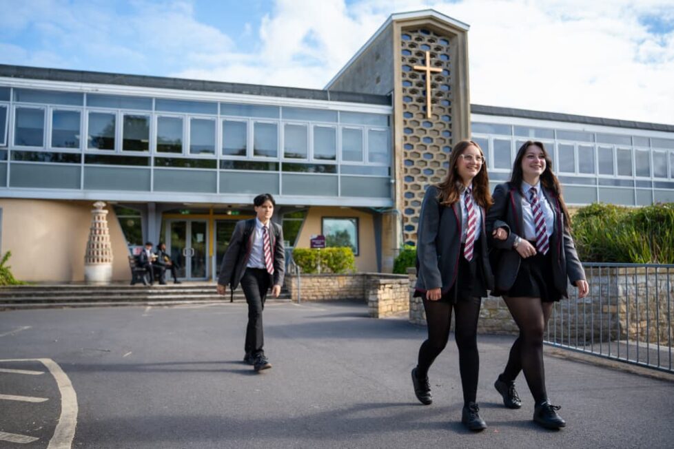 Students walking away from St Mark's school main entrance